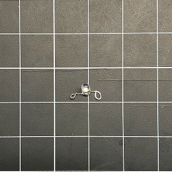 I wanted to try and create a bracelet. I began by curving the ends of the light so I could sew it on a piece of felt.