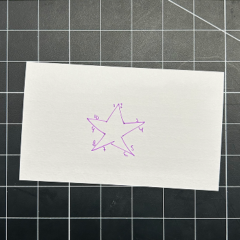 I wanted to try to create a star. I started by mapping out how many pieces of tape I needed.