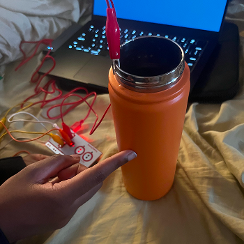 I tested this water bottle. I was curious if the orange coating would be conductive. It was not