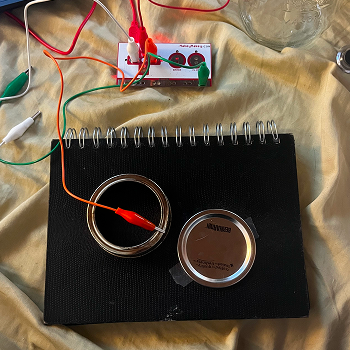 I experimented with using mason jars as a buttons. The different components of the lid made it complicated and I wasn't successful.